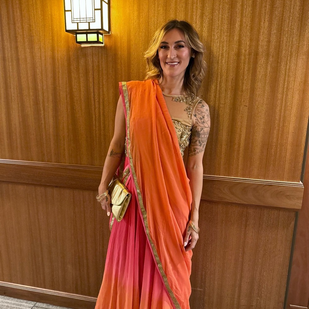 Elegant Orange and Pink Sari with Gold Accents